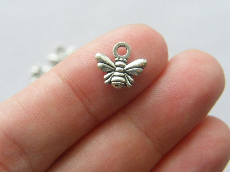 12 Bee charms antique silver tone A312