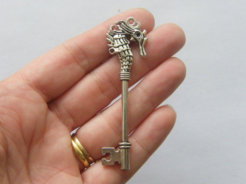 2 Seahorse key pendants antique silver tone K45
