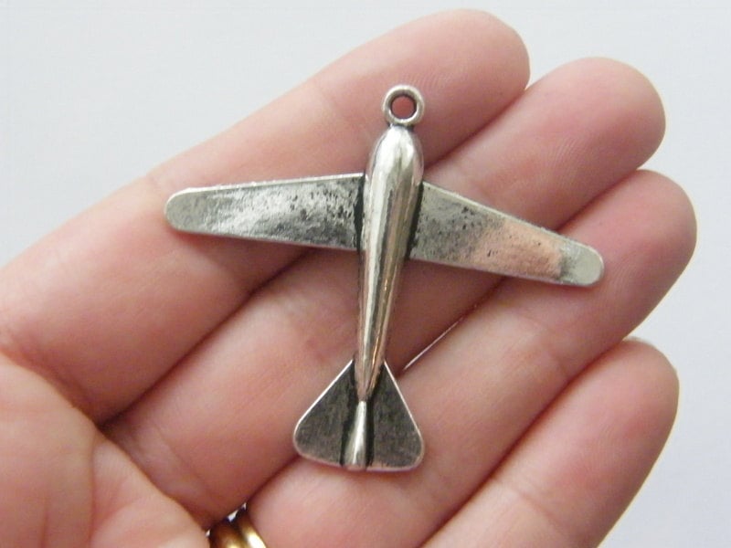 2 Aeroplane pendants antique silver tone TT36