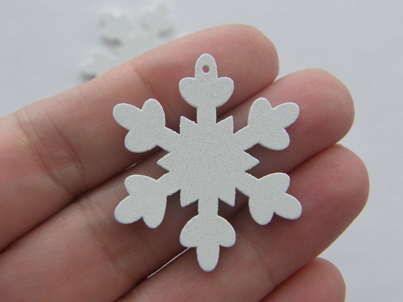 10 White wooden snowflake pendants ( double sided ) 35 x 30mm