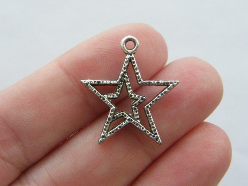 10 Star charms antique silver tone S37