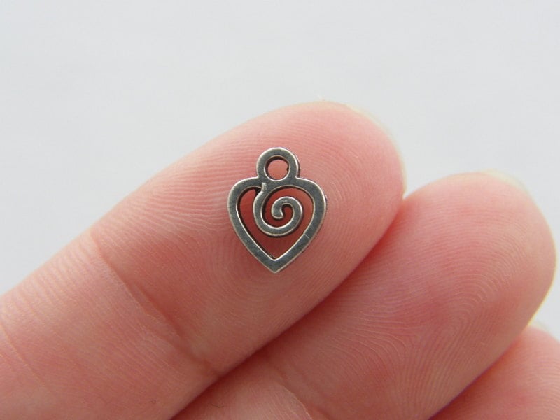 14 Heart spiral charms tibetan silver H93