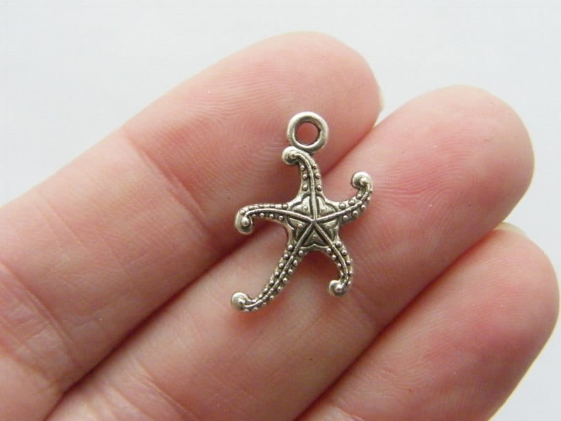 8 Starfish charms antique silver tone FF240