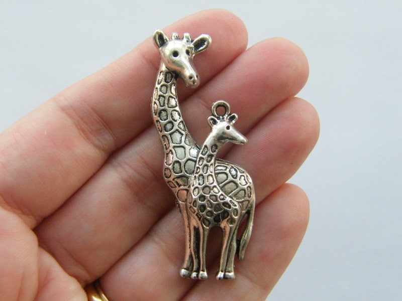 2 Giraffes charms antique silver tone A23