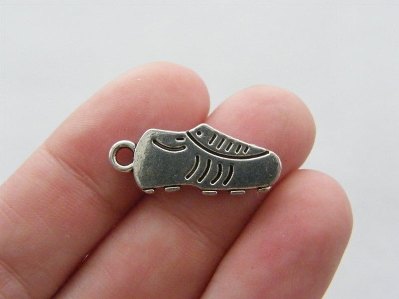 10 Soccer cleat charms antique silver tone SP20