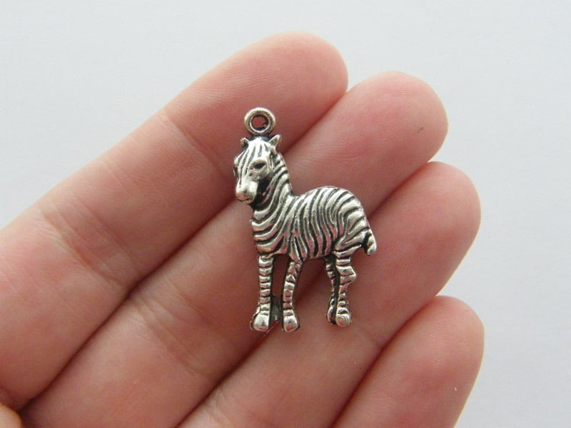 8 Zebra pendants antique silver tone A37