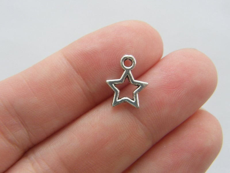 14 Star charms antique silver tone S222