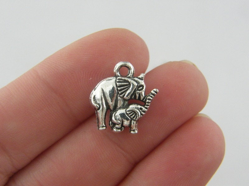 8 Elephants charms antique silver tone A520