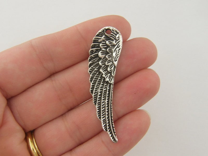 4 Angel wing charms antique silver tone AW12