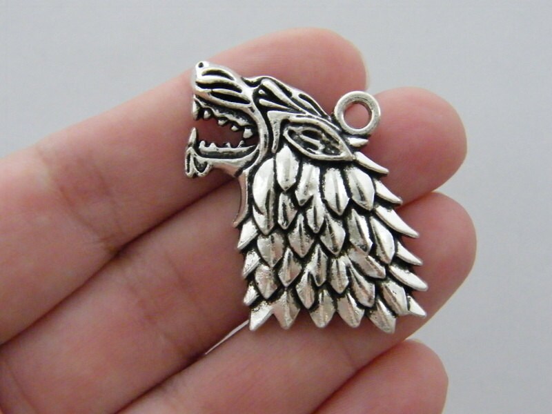 4 Wolf charms antique silver tone A273