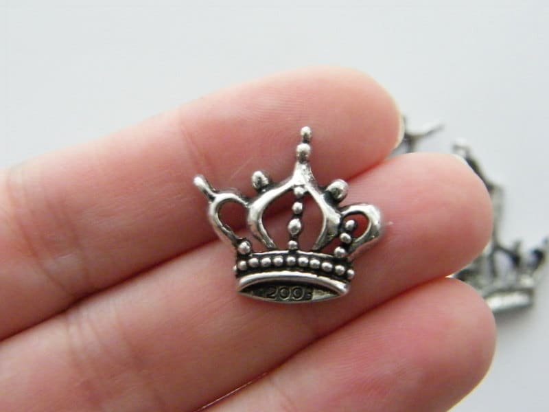 8 Crown charms antique silver tone CA8