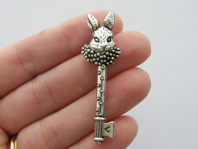 2 White rabbit key pendants antique silver tone K68