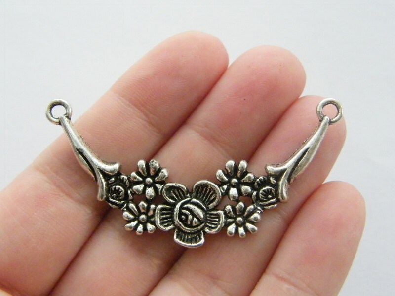 4 Flower connector charms antique silver tone F151