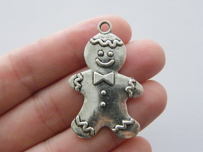 2 Gingerbread man pendants antique silver tone CT84