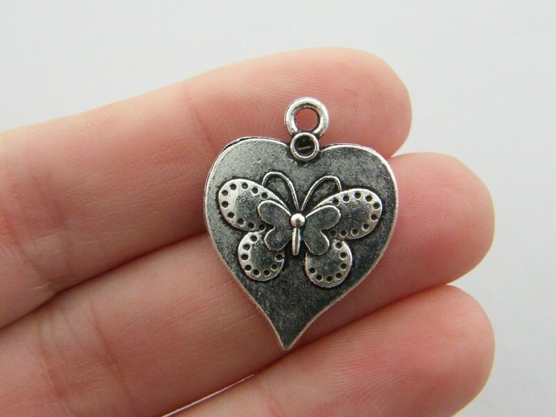 6 Butterfly charms antique silver tone A324