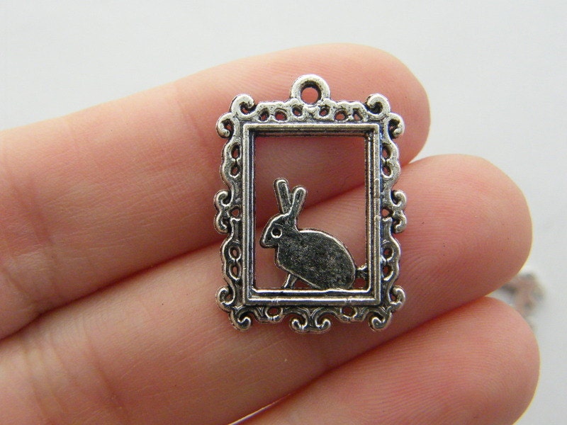 6 Rabbit charms antique silver tone A261