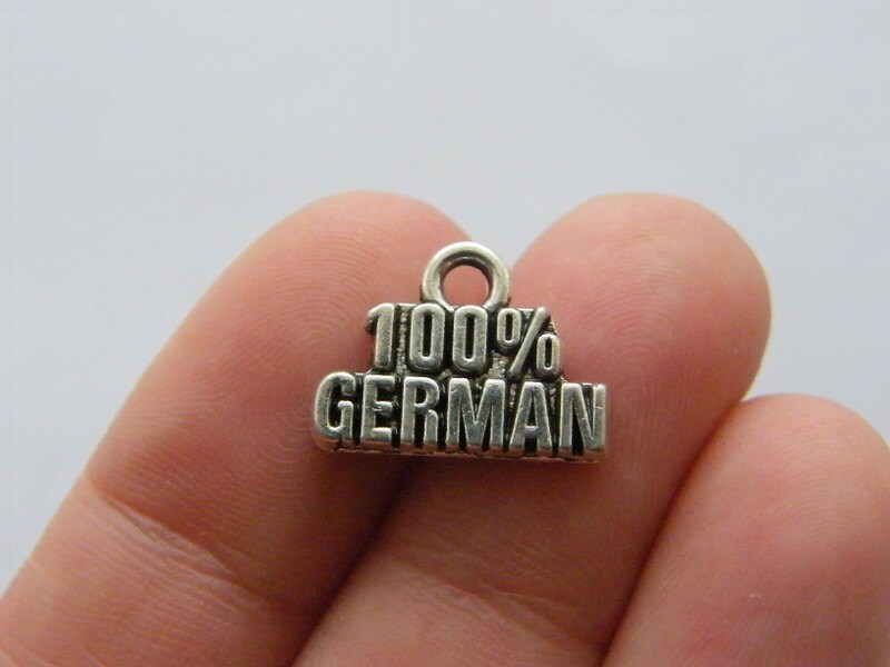 12 100% German charms antique silver tone M562