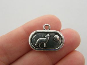 8 Wolf charms antique silver tone A456