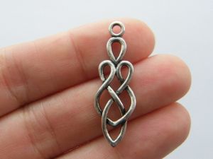 Bulk 10 Celtic knot charms antique silver tone R95