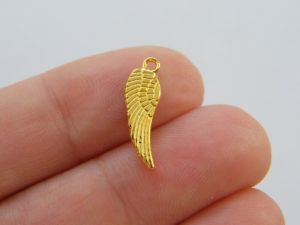 16 Angel wing charms bright gold tone AW36