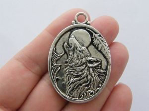 2 Wolf pendants antique silver tone A482