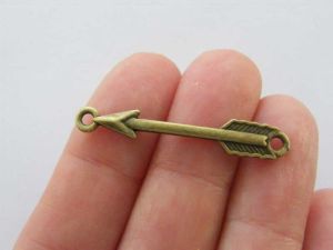 10 Arrow connector charms antique bronze tone G47