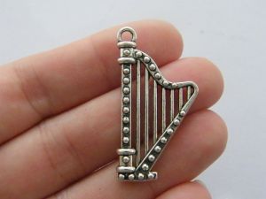 4 Harp charms antique silver tone MN66