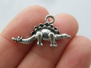 4 Dinosaur Stegosaurus charms antique silver tone A221