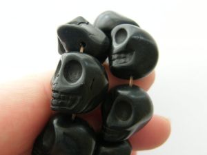 22 Black skull beads 15 x 12mm SK16