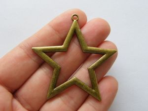 4 Star pendants antique bronze tone S51