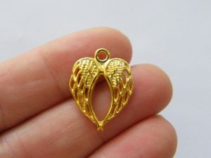 8 Angel wing charms gold tone AW48