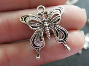 6 Butterfly pendant antique silver tone A339