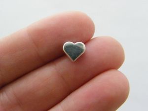 12 Heart spacer beads antique silver tone H33