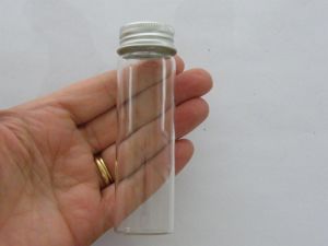 4 Mini glass bottles with screw on lids GB75
