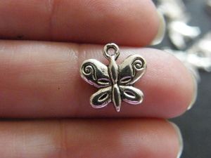 14 Butterfly charms antique silver tone A357