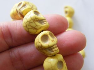 22 Yellow skull beads 15 x 12mm SK17