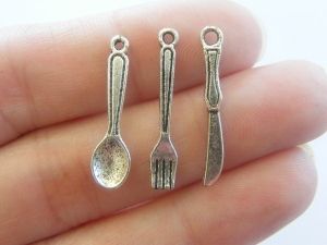 The Cutlery Collection - 24  antique silver tone charms