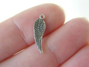 16 Angel wing  charmstibetan silver AW20