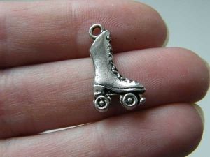 8 Roller skate charms antique silver tone SP48