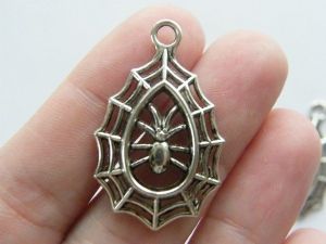 8 Spider in a spiderweb pendants antique  silver tone HC133