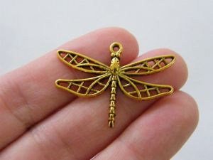 8 Dragonfly charms antique gold tone A838