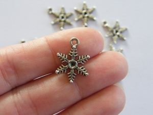 14 Snowflake charms antique silver tone SF9