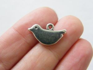 10 Bird charms antique silver tone B264