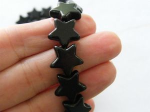 21 Star beads 14 x 15mm  black S2