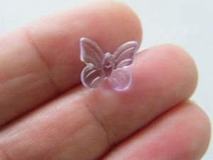 14 Butterfly beads purple glass A617