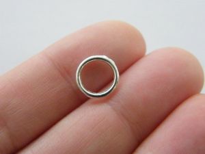 100 Jump rings 10mm silver plated - soldered closed FS117