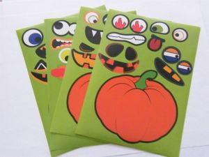 4 Pumpkin face stickers all slightly different