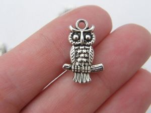 8 Owl charms antique silver tone B303