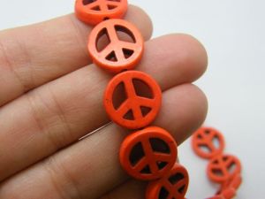 24  Orange peace sign beads 15 x 15mm P1