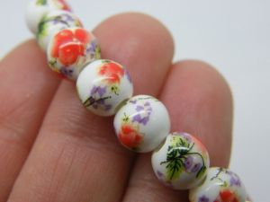 40 Flower beads  9 x 8mm white ceramic B227